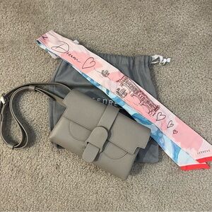 Senreve Aria Belt Bag in Pebbled/Sand color with the Azure City Scarf Twilly